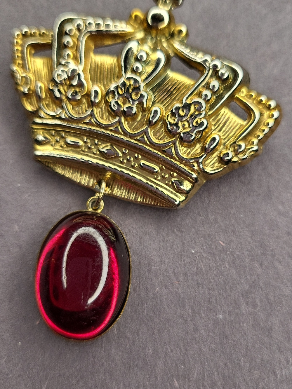 Gold Crown Brooch with Red Gem